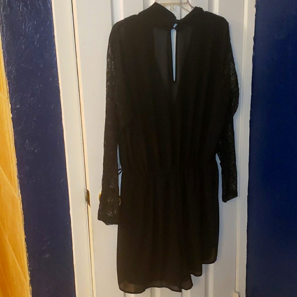 Ladies sheer black romper